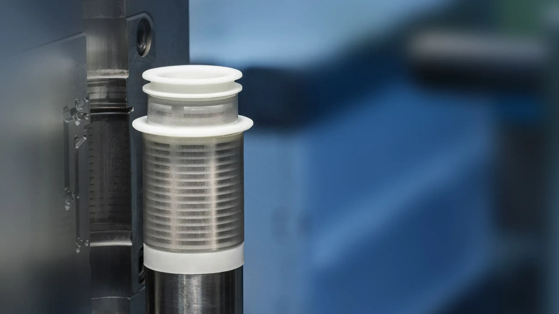Mesh filter cylinder standing in the injection moulding tool