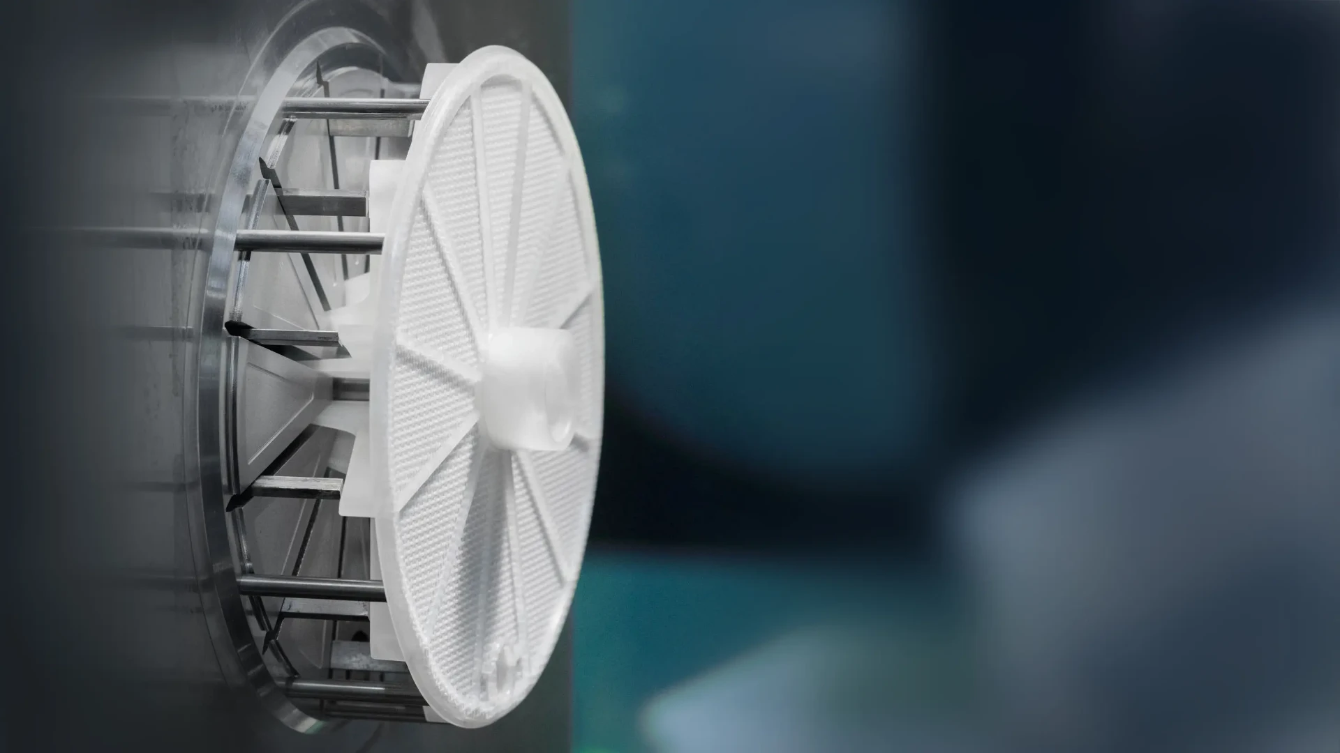 Moulded plastic filter with spokes fresh from the machine