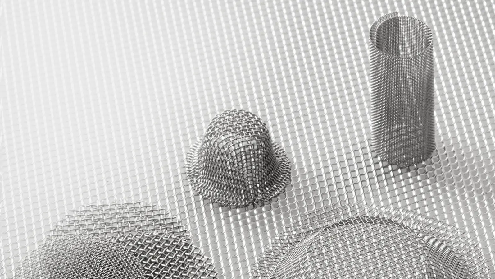 Stainless steel mesh discs, caps and cylinders on fine mesh